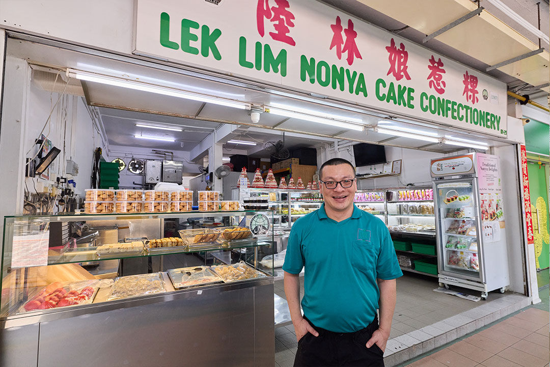 Gavan at the front of Lek Lim’s retail store at Bedok